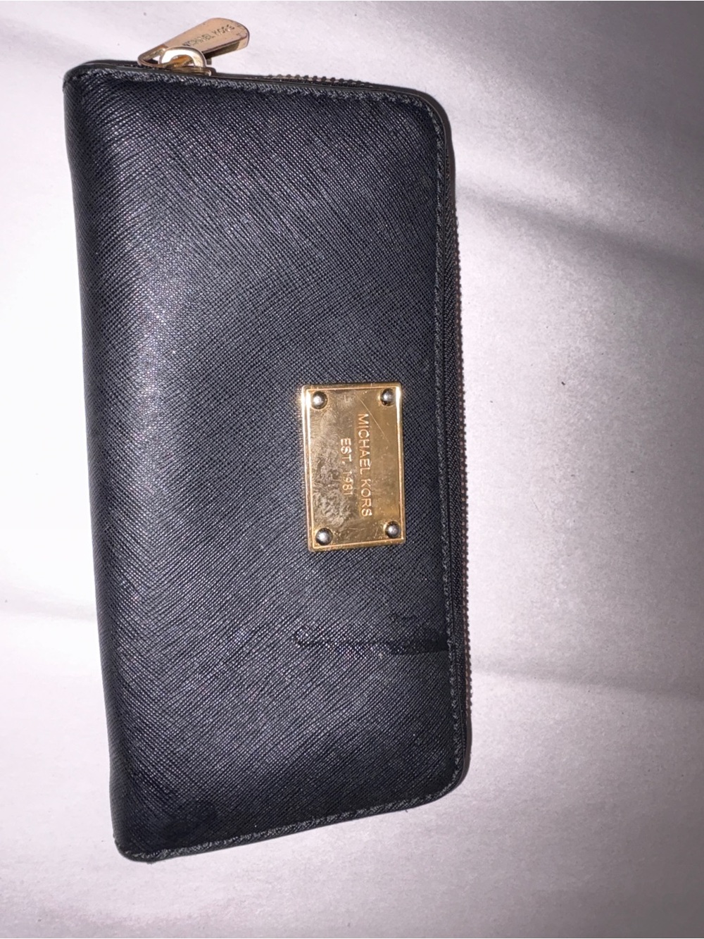 MICHAEL KORS Black Zip Around Wallet with Gold Plaque